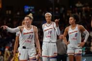 Sami Whitcomb #33 of the Phoenix Mercury, DeWanna Bonner #14 of the Phoenix Mercury and Satou Sabally #0 of the Phoenix Mercury talk on the court during a game between Phoenix Mercury and Atlanta Dream at Gateway Center Arena on August 1, 2025 in College Park, Georgia. - Source: Getty